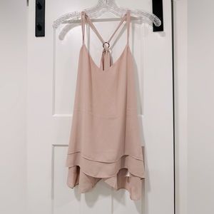 Pink Maurices tank top.